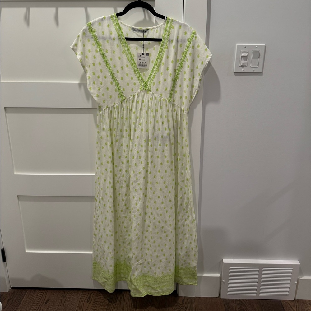 Dress or cover up by Zara.